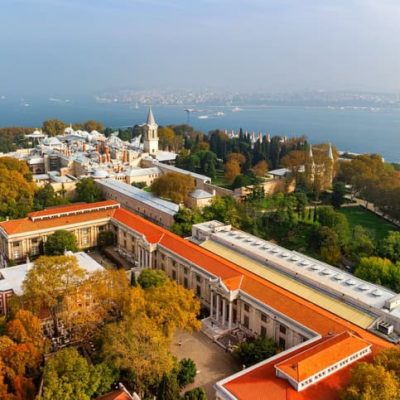 Awesome aerial view of the Topkapi Palace in Istanbul, Turkey. Drone flying over the city. The Bosporus is visible in background. Amazing cityscape.